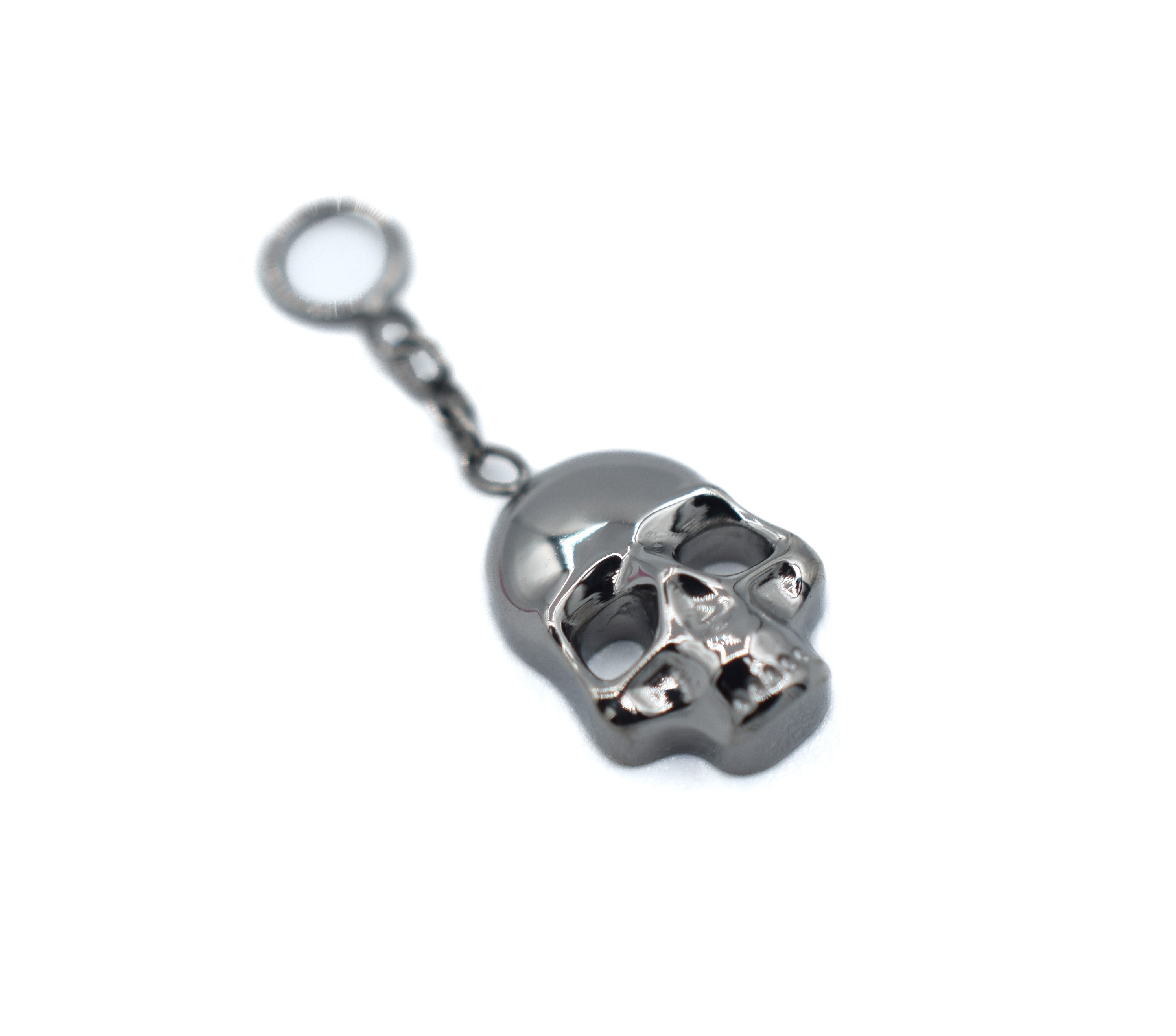Titanium Skull Charm by Crucial