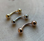 Solid 14k Gold Curved Barbell by Body Gems