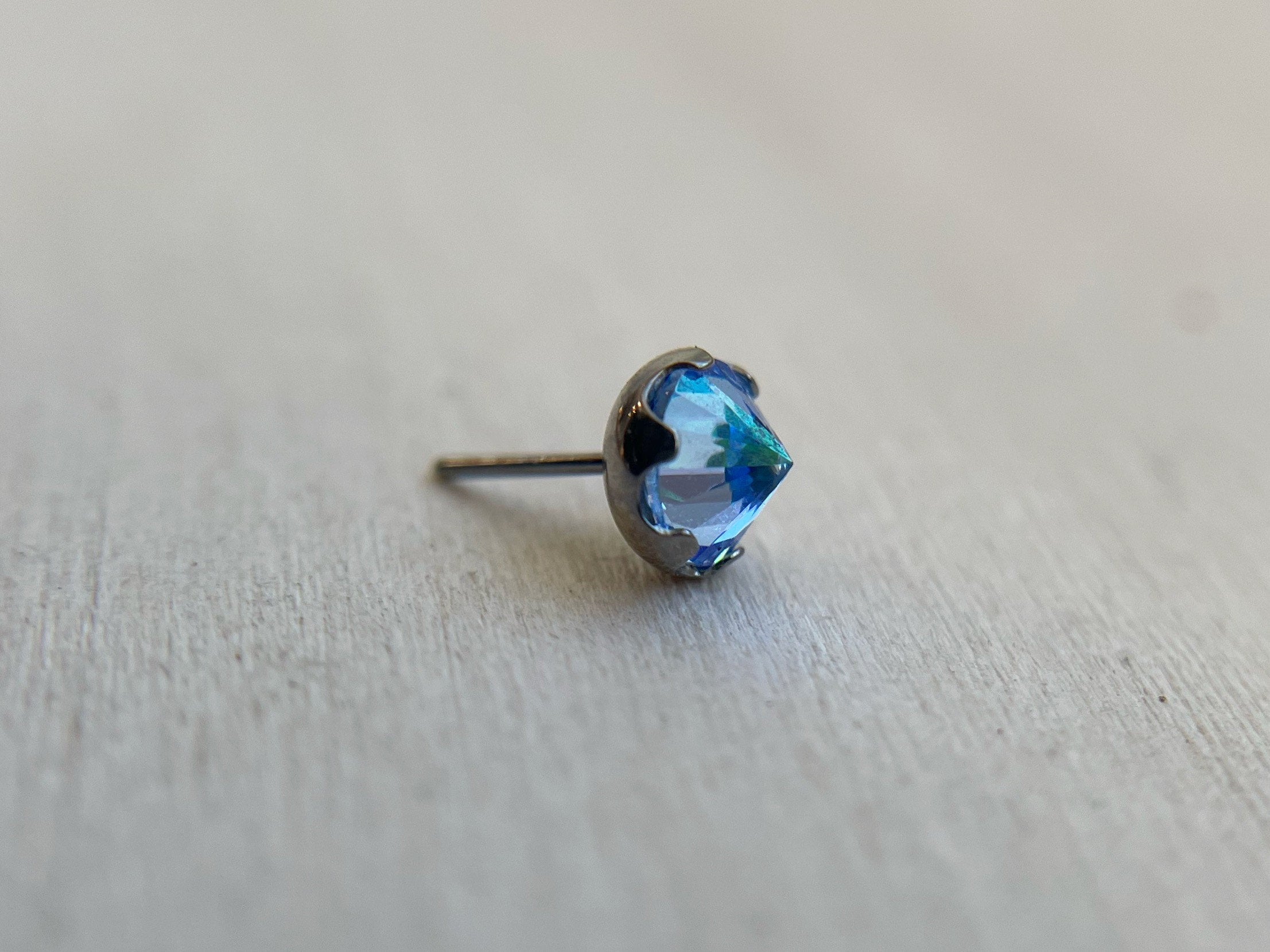 Reverse Set Prong Gems by People's Jewelry