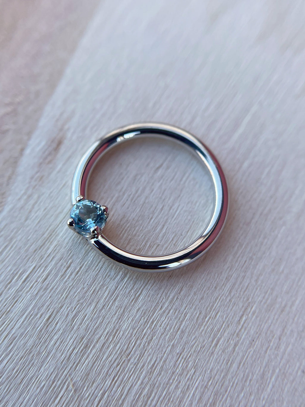 Prong set Swiss Blue Topaz Fixed Bead Seam Ring by BVLA