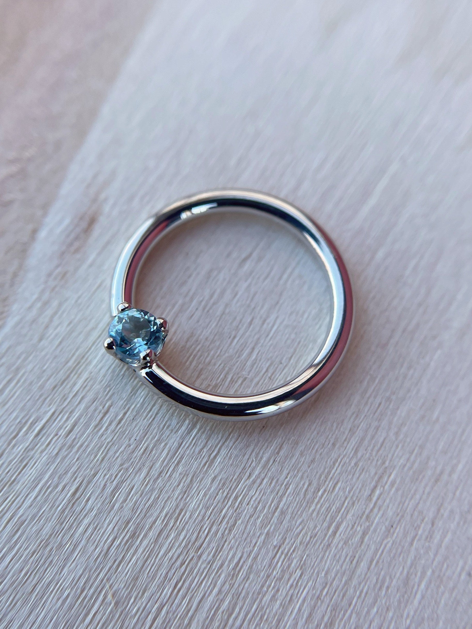 Prong set Swiss Blue Topaz Fixed Bead Seam Ring by BVLA