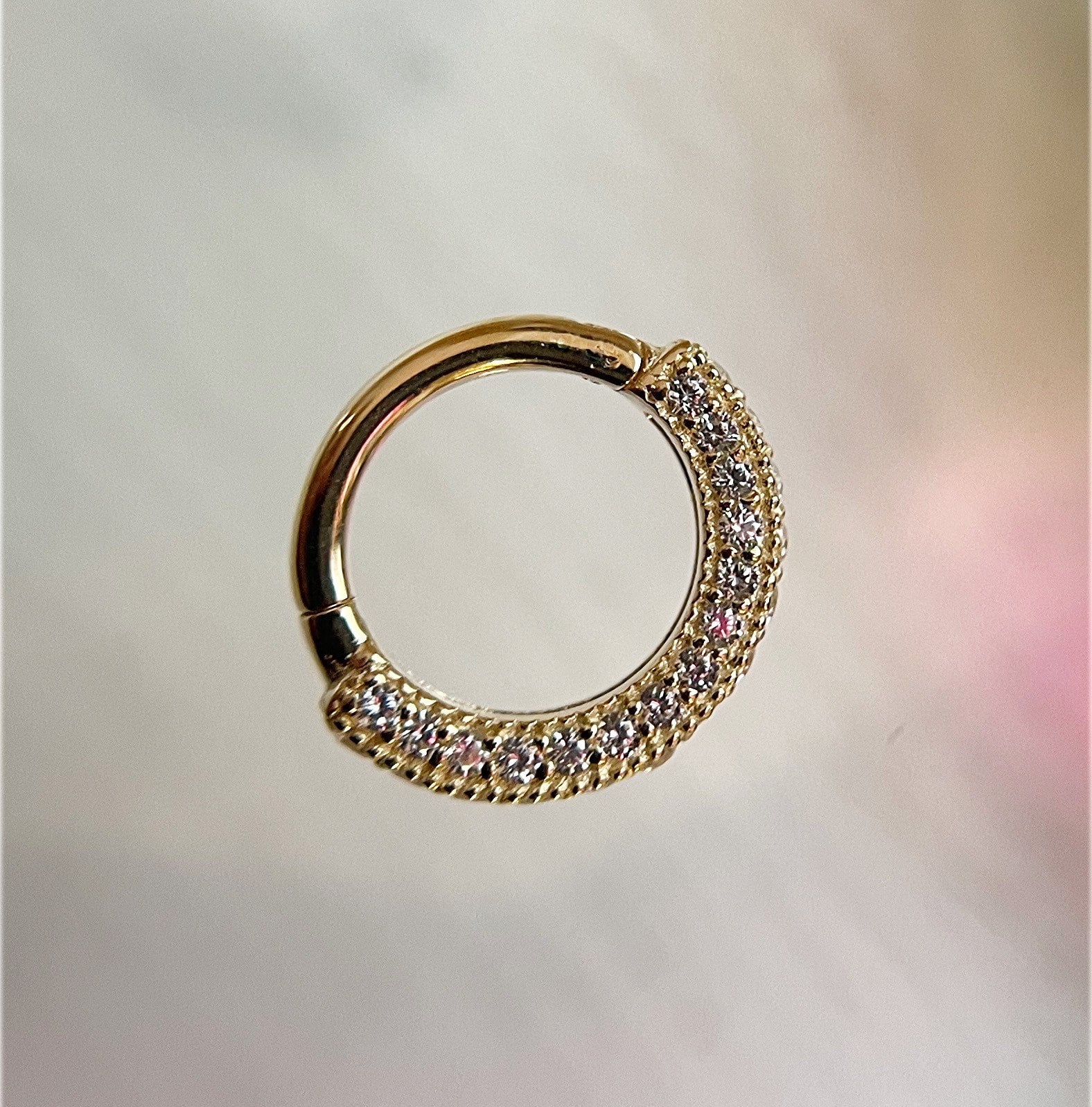 Showcase - CZ Clicker by Buddha Jewelry