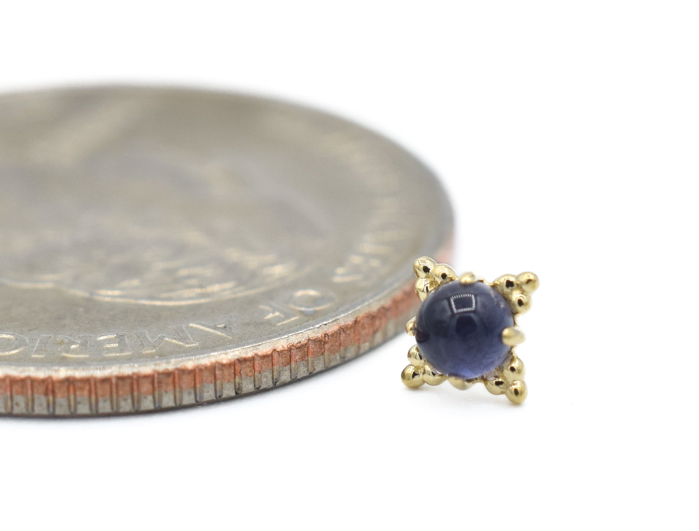 Zia with Iolite by Anatometal