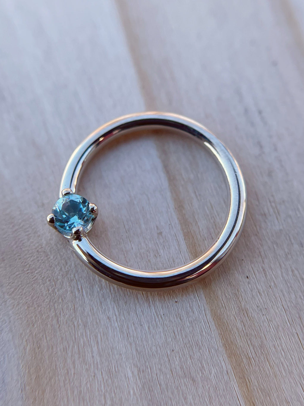 Prong set Swiss Blue Topaz Fixed Bead Seam Ring by BVLA