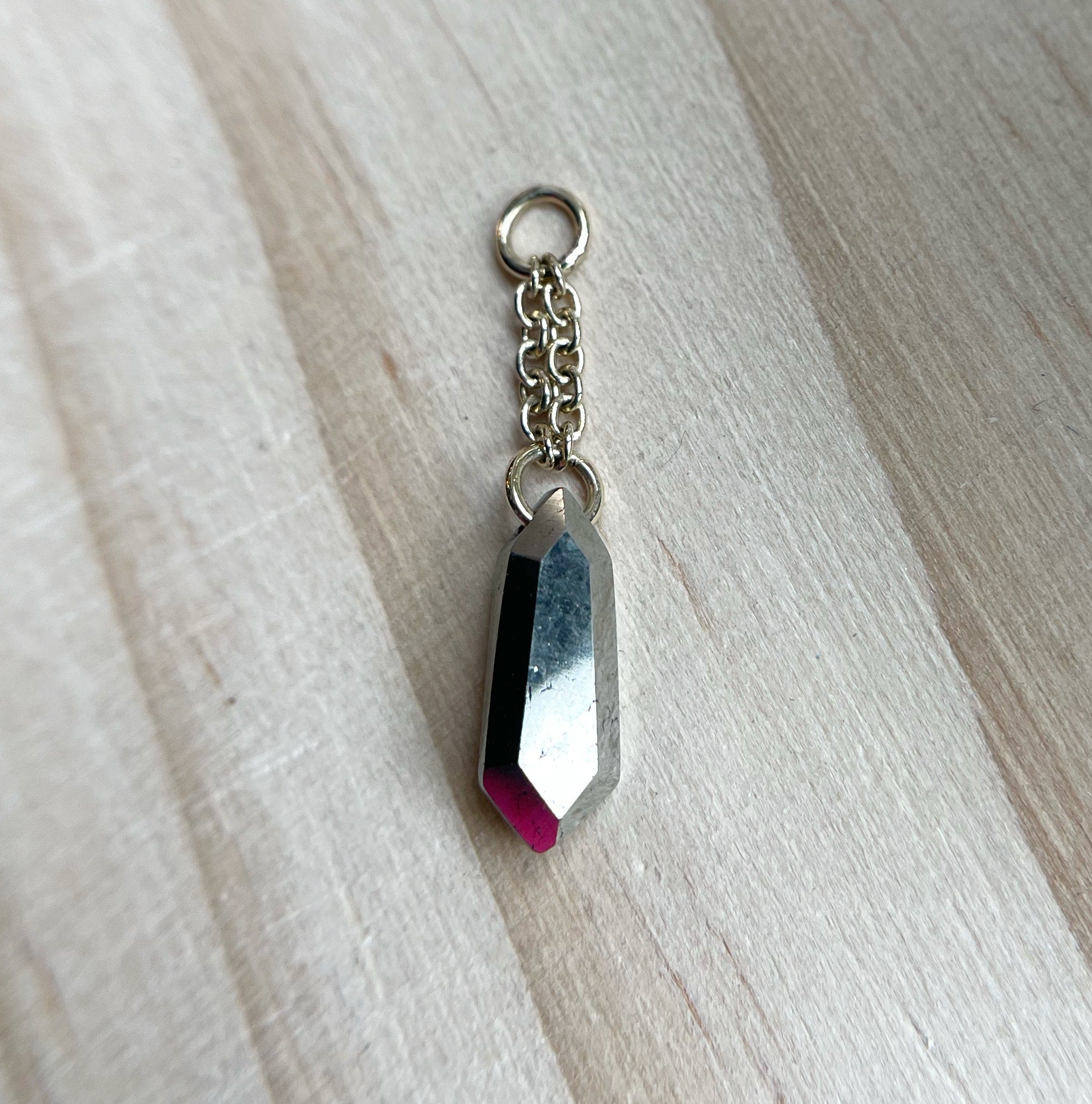 The Pendulum Dangle Charm by Hialeah Fine Jewelry