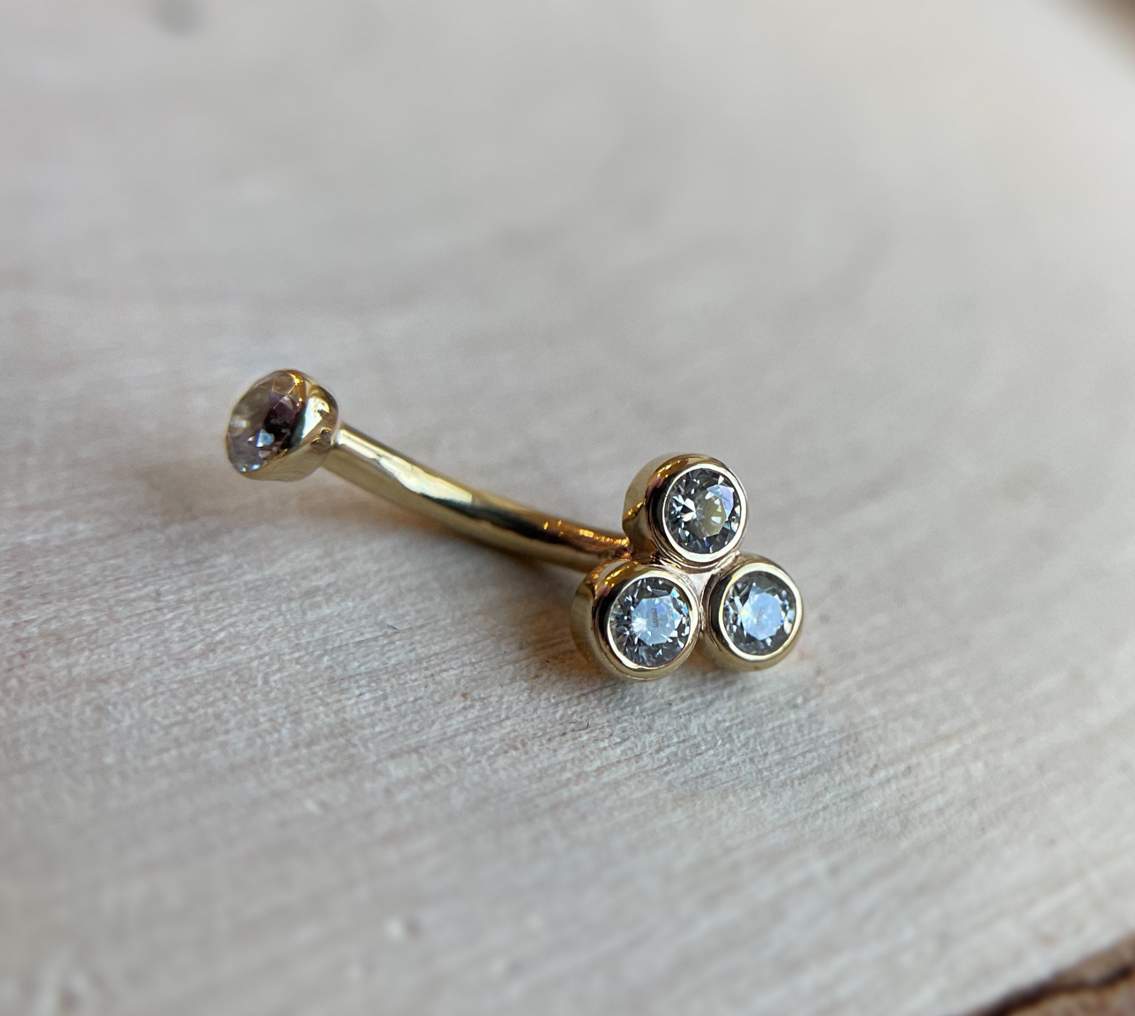 14k Tri-Bezel Curved Barbell by Body Gems