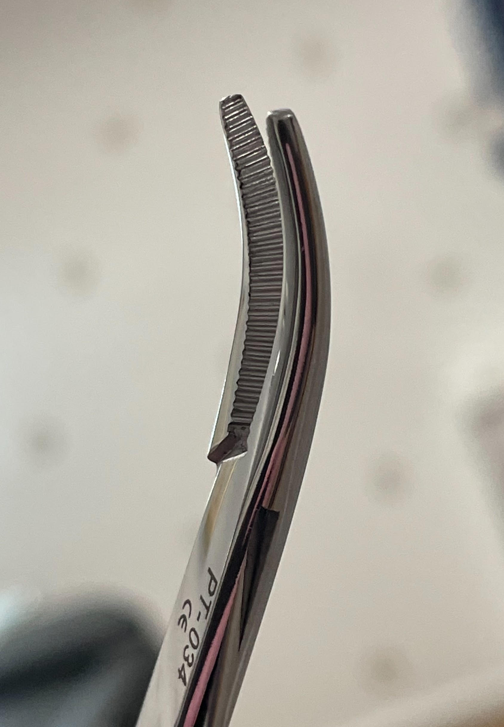 Curved Hemostat Jewelry Tool